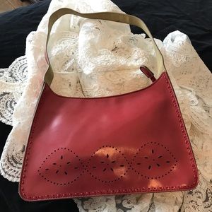 Red laser cut out trim mid size bag
